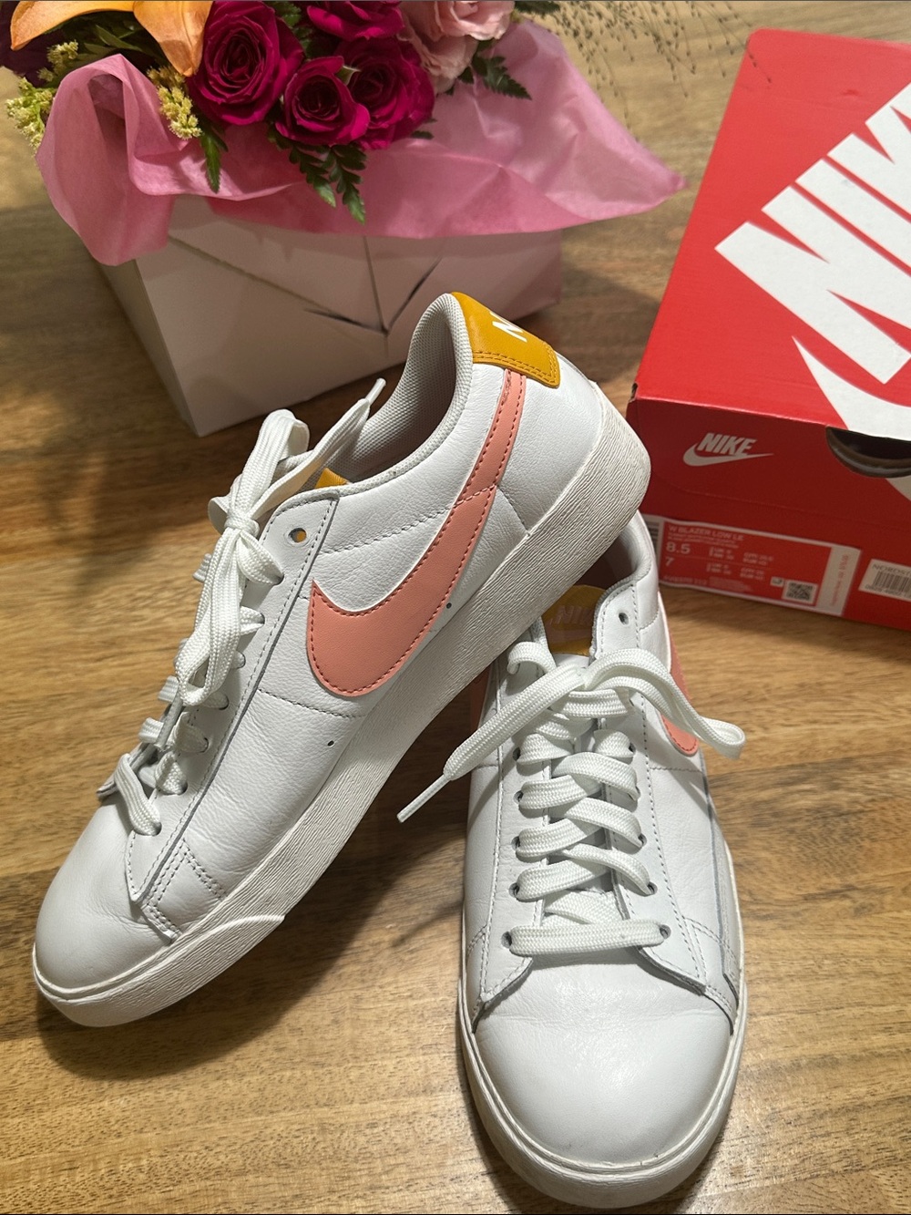 Nike Women’s White Sneakers with Pink Swoosh and Yellow Heel Tab
